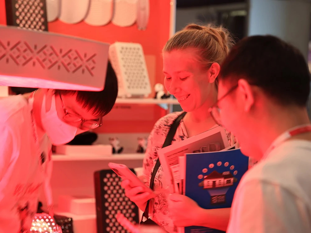Customer exploring product features at exhibition